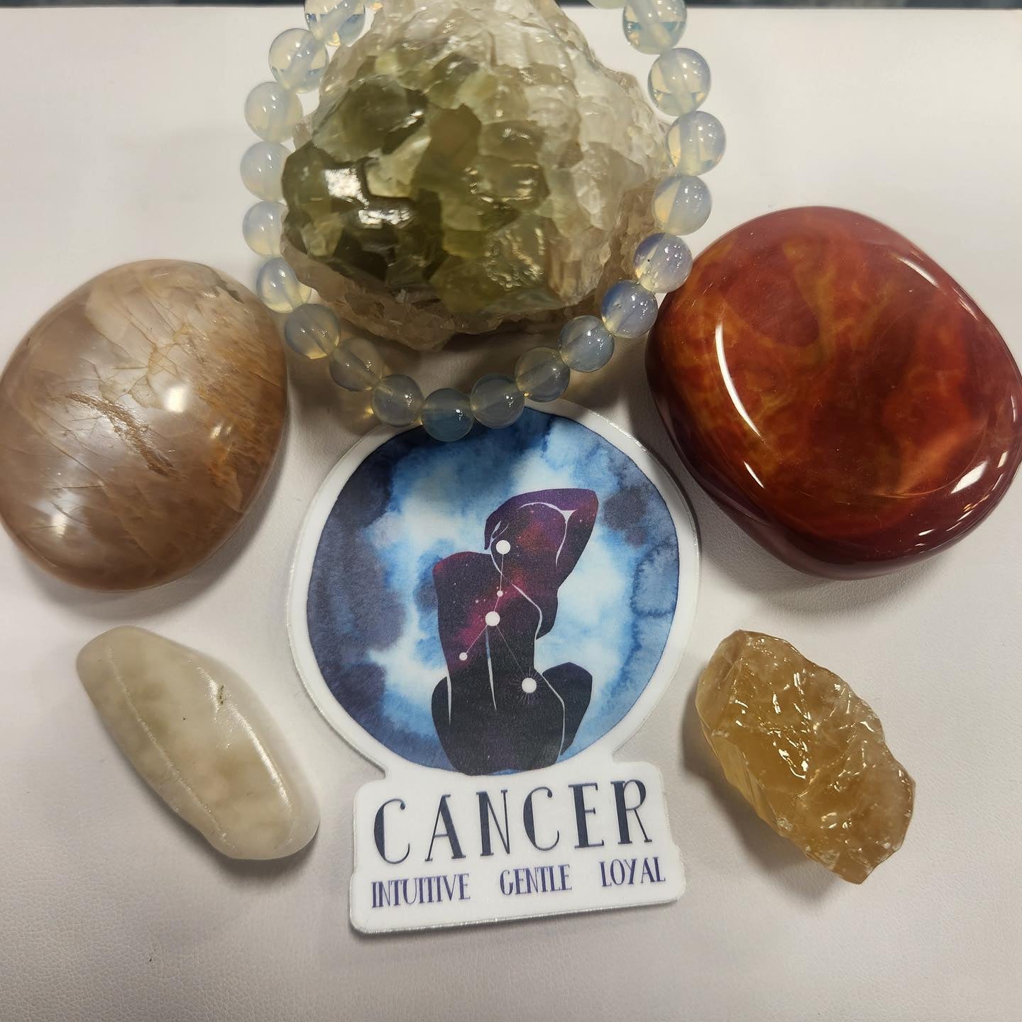 EMBRACING THE CANCER SEASON: A GUIDE TO CRYSTALS